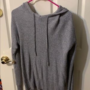 Cute grey sweater with hood.